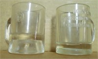 2 small glass American Nut Co. measuring cups