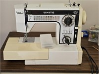 Older White sewing machine