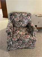 Flowered overstuffed arm chair