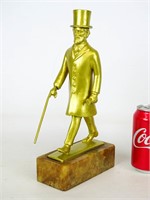 Sculpture of a Man With Cane