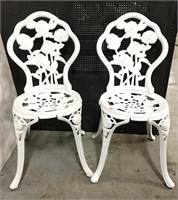 Pair of white metal patio chairs