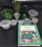 Assorted glass containers and gardening book