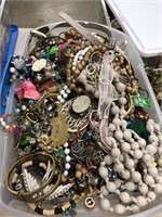 Big box full of miscellaneous jewelry. 10 inches