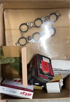 Whole box of new car parts