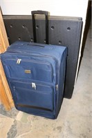 Large Blue Rugged Suitcase on Wheels