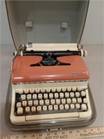 Torpedo salmon colored typewriter