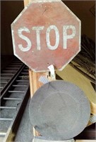 Tin Stop Sign & Man Hole Cover