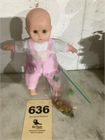Doll , baby, with blinking eyes, and marbles