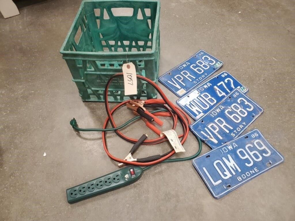 Milk crate, jumper cables, license plates