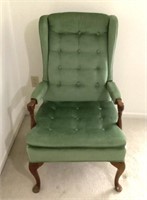 Green wingback armchair