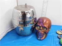 METAL BARREL  AND PLASTIC SKULL