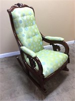 ANTIQUE UPHOLSTERED ROCKING CHAIR