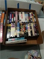 Box of assorted VCR tapes