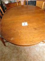 62" x 45" oak dining table w/ claw feet -