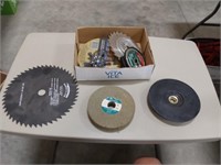 assortment of cutting blades and sanders