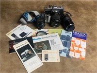 Minolta SRT101 Vintage Camera with three lenses