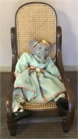 SMALL ROCKING CHAIR WITH ELEPHANT DOLL