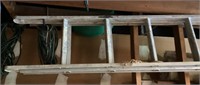 8’ aluminum extension ladder in garage