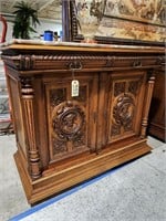 Stately antique cabinet with marble top