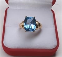 Sterling Gold Tone Blue Topaz Ring.  Ring is size