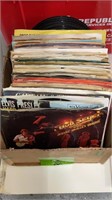 BOX OF SIZE 45 RMP VINYL RECORDS