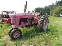 pink Farmall M runs and drives