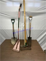 Assorted hand tools, shovels, pickax, rake, roofin