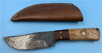 Damascus bladed knife, with wood handle and leathe