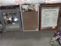 2 framed mirrors and an unopened 2 sided bulletin