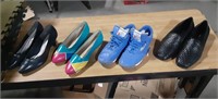 Four pairs of shoes Reebok compliments St John's