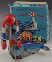 SEAL PLAYING A BALL WIND UP TOY TIN LITHO IN BOX