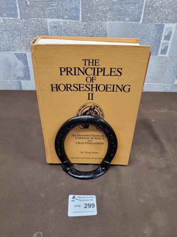 Metal horse shoe book holder & Horseshoeing book