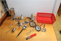 Thermometers, spoons, bottle opener