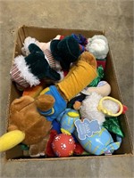 Box with stuffed animals and dog toys