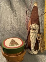 (D) Primitive Santa Claus and wicker basket with