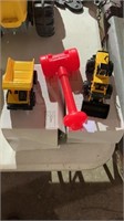 Mini toy tonka truck, bulldozer, and hammer