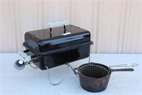 Weber Portable gas grill & Lodge cast iron pan