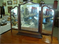 Trifold mahogany dressing mirror.