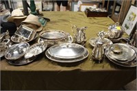 Lare Collection of Silverplate; trays, pitchers,