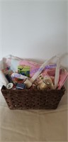 Sewing basket w/ material and thread.