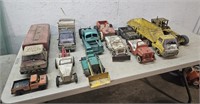 Tonka trucks, others, all damaged