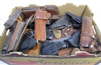 Large grouping of leather holsters, some ammo