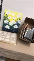 Group of picture frames with canvas art