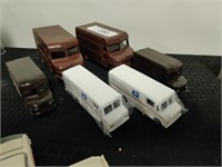 4 UPS and 2 USPS delivery trucks, all new