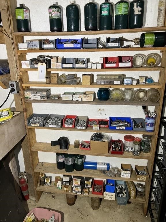 CONTENTS ONLY OF SHELVING ON WALL