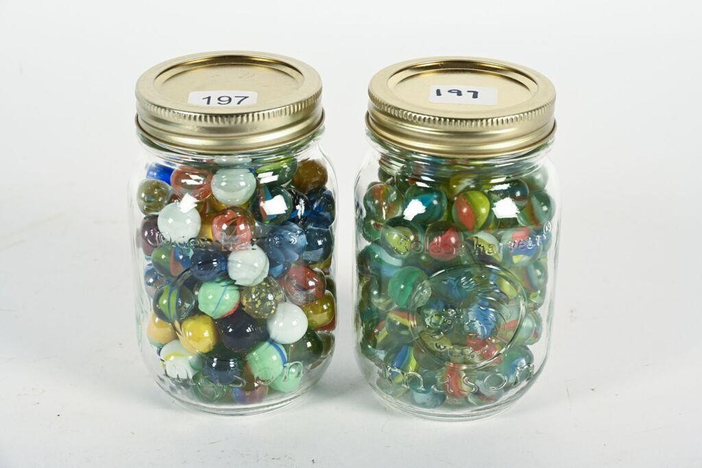 2 PINT JARS OF MARBLES