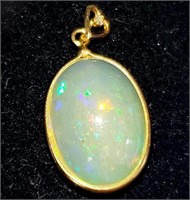 $1200 10K  Natural Opal 4Ct And Diamond  Pendant