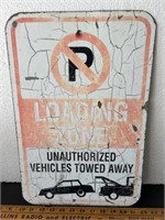 Metal signs. Loading Zone.