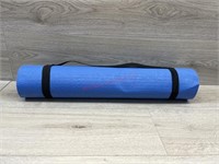 Yoga mat with carry strap