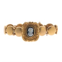 A Lady's Onyx Cameo Bracelet in Gold